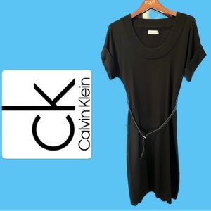 Black dress by Calvin Klein. Size S, length midi. 50% wool, 50% acrylic